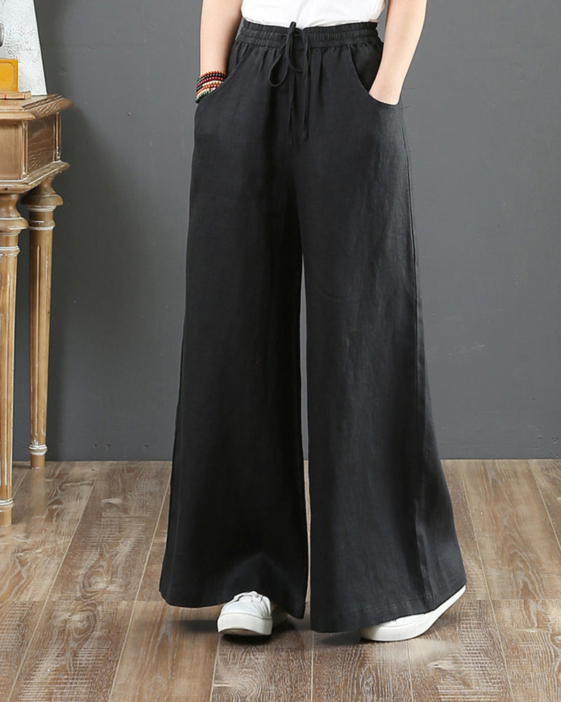 Pantalon large taille haute de couleur unie