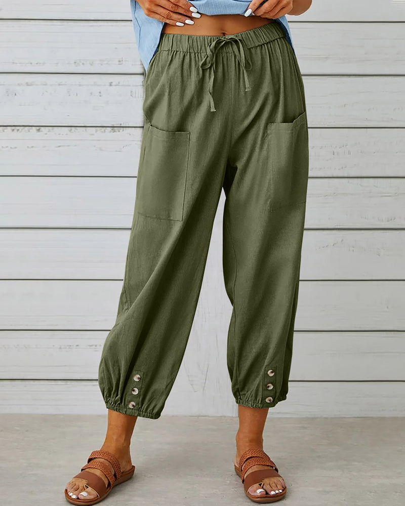 Pantalon taille haute bouton neuf points